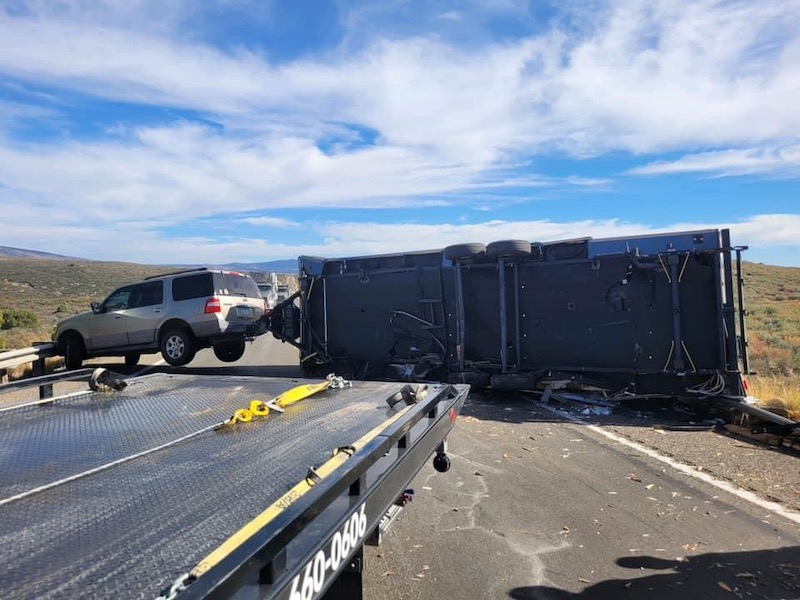 Accident Recovery Towing Travel Trailer Rolled Over while still attached to SUV