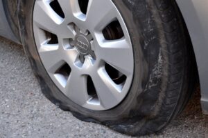 Vehicle tire damaged due to driving on a Flat tire