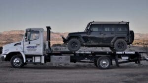 Hoist Towing Black Jeep breakdown off-road
