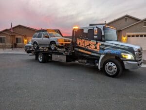 Towing in Prescott AZ – SUV flatbed towing by Hoist Towing & Recovery